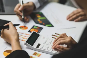 Financial Advisory Meeting Analyzing Marketing Strategies, Investment Planning and Accounting Finance